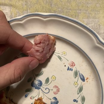 Brother's Pizza - a piece of meat on a plate - Pizza Near Me - Rialto, California