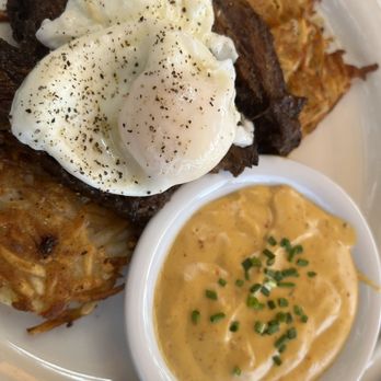 Briarpatch Restaurant - Short Rib Benedict, so good!!! Sauce on side. An avocado there too. Harsh browns good but should have skipped. Filing - American Near Me - Winter Park, Florida