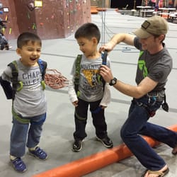 Boys getting in their little harnesses.