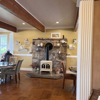Tea Cup Cafe & Bakery - Dining seating space with fireplace. - Bakeries Near Me - Challis, Idaho