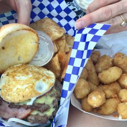 Uprooted Kitchen - Benedict Burger with pub chips, fried cheese curds