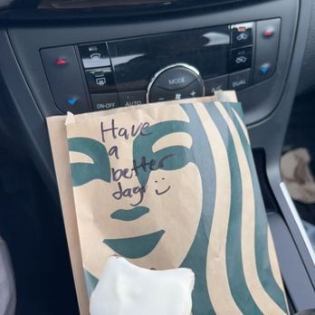 Starbucks - a hand holding a bag of marshmallows - Coffee & Tea Near Me - Oneonta, New York