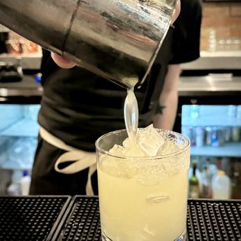 Ironhorse Kitchen + Bar - a bartender pouring a drink - Bars Near Me - Minot, North Dakota Ironhorse Kitchen + Bar - a bartender pouring a drink - Bars Near Me - Minot, North Dakota