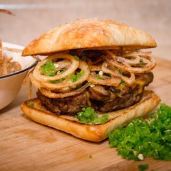 T's Chips - The Jalapeno is 1/2 lb of lean ground beef, sauteed mushrooms, real cheddar, crispy onions and fresh minced jalapeno.