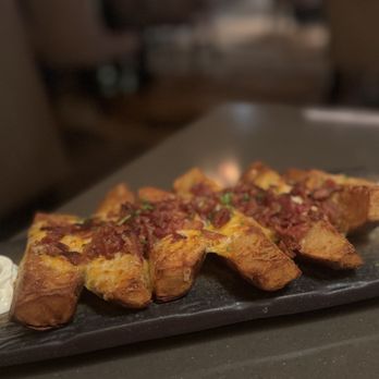 Garrison Oak Steakhouse - Loaded potato wedges - Steakhouses Near Me - Oak Grove, Kentucky Garrison Oak Steakhouse - Loaded potato wedges - Steakhouses Near Me - Oak Grove, Kentucky