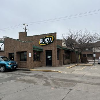 Runza Restaurants - a car parked in front of a runza restaurant - Burgers Near Me - Lincoln, Nebraska Runza Restaurants - a car parked in front of a runza restaurant - Burgers Near Me - Lincoln, Nebraska