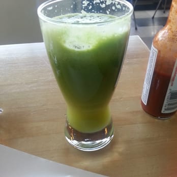 Laughing Planet - Cucumber kale apple ginger lemon juice. Kind of overpowered by spicy gingery lemon. - Salad Near Me - Eugene, Oregon