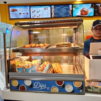 Auntie Annie - a woman behind the counter of a donut shop - Pretzels Near Me - Houston, Texas Auntie Annie - a woman behind the counter of a donut shop - Pretzels Near Me - Houston, Texas