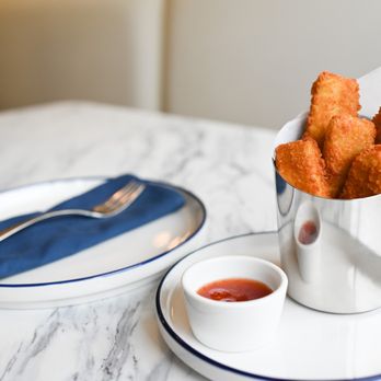 Oceanic Thai Kitchen - a plate of deep fried chicken nuggies and dipping sauce - Thai Near Me - Plano, Texas