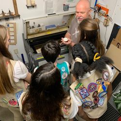 Tampa Hackerspace - Girl Scouts laser engraving marshmallows