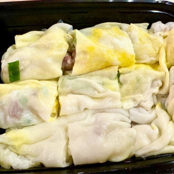 Joe's Steam Rice Roll - Large BBQ Pork Steam Rice Roll with added egg and before adding sauce/chili oil - Dim Sum Near Me - Flushing, New York Joe's Steam Rice Roll - Large BBQ Pork Steam Rice Roll with added egg and before adding sauce/chili oil - Dim Sum Near Me - Flushing, New York