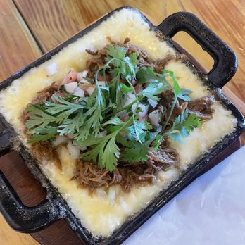 Mala Madre Taqueria - queso with meat - Tacos Near Me - Westbury, New York Mala Madre Taqueria - queso with meat - Tacos Near Me - Westbury, New York