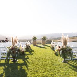 Magical ceremony arrangements with pampas grass. It came together so beautifully! The light & movement through the pampas grass was magical! Magical ceremony arrangements with pampas grass. It came together so beautifully! The light & movement through the pampas grass was magical!