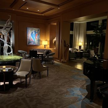 The Umstead Hotel - Lounge area adjoining bar with harps and piano - Hotels Near Me - Cary, North Carolina The Umstead Hotel - Lounge area adjoining bar with harps and piano - Hotels Near Me - Cary, North Carolina