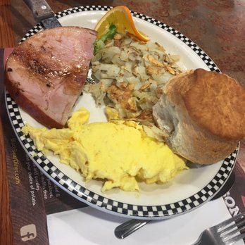 Black Bear Diner Fullerton - My son's ham steak, eggs, hash browns, and that HUGE biscuit! You can see how big the food is by comparing it to the knife on the plate. - American Near Me - Fullerton, California