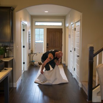 J & M Services - Client sent us this pic of Co-Owner, Jeremiah, spreading out drop cloth at the start of an Air Duct Cleaning job. Tank Top is an Owner perk! - Heating & Air Conditioning/HVAC Near Me - Vancouver, Washington J & M Services - Client sent us this pic of Co-Owner, Jeremiah, spreading out drop cloth at the start of an Air Duct Cleaning job. Tank Top is an Owner perk! - Heating & Air Conditioning/HVAC Near Me - Vancouver, Washington