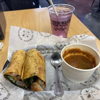 Clean Eatz - Bang bang shrimp wrap with tomato soup side. Grape flavored water for a beverage - Cafes Near Me - Stafford, Virginia Clean Eatz - Bang bang shrimp wrap with tomato soup side. Grape flavored water for a beverage - Cafes Near Me - Stafford, Virginia