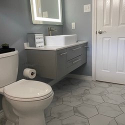 Home Remedy - Bathroom remodel. Great job on tiling, floating cabinet install, and kids love their LED mirror!