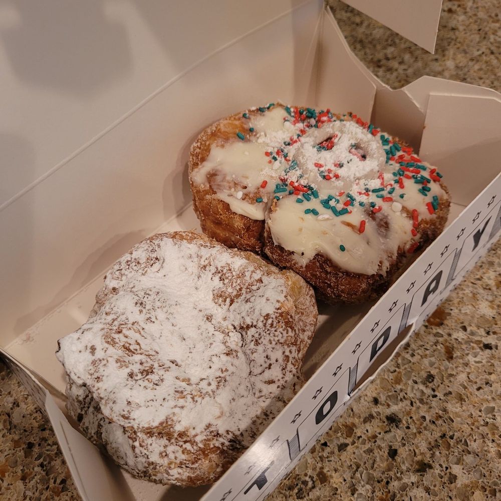 Parlor Doughnuts - Raspberry filled (left) and White Christmas (right) - Donuts Near Me - St. Augustine, Florida Parlor Doughnuts - Raspberry filled (left) and White Christmas (right) - Donuts Near Me - St. Augustine, Florida