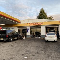 Shell Gas Station - Busy day repairing cars.