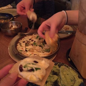 Painted Burro Brookline - Us attacking the squash and cauliflower queso fundidos and guacamole - Mexican Near Me - Brookline, Massachusetts
