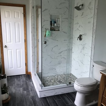 J.A.G.S Contracting - ws a bathroom with a walk in shower - General Contractors Near Me