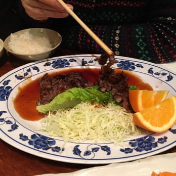 Sushi Tomi - Beef teriyaki served hot and very tender, reddish pink in middle - Sushi Bars Near Me - Mountain View, California