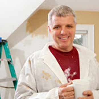 Renovations With Panache - a man holding a cup - General Contractors Near Me - Chicago, Illinois Renovations With Panache - a man holding a cup - General Contractors Near Me - Chicago, Illinois