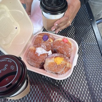 Passion Bakery Cafe - Malasadas--coconut, mango, POG and ube. POG and coconuts are my favorite. - Bakeries Near Me - Kapaa, Hawaii