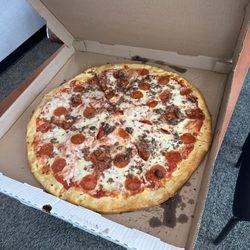 Holiday Pizza - 24" pizza with pepperoni, bacon, and ground beef.