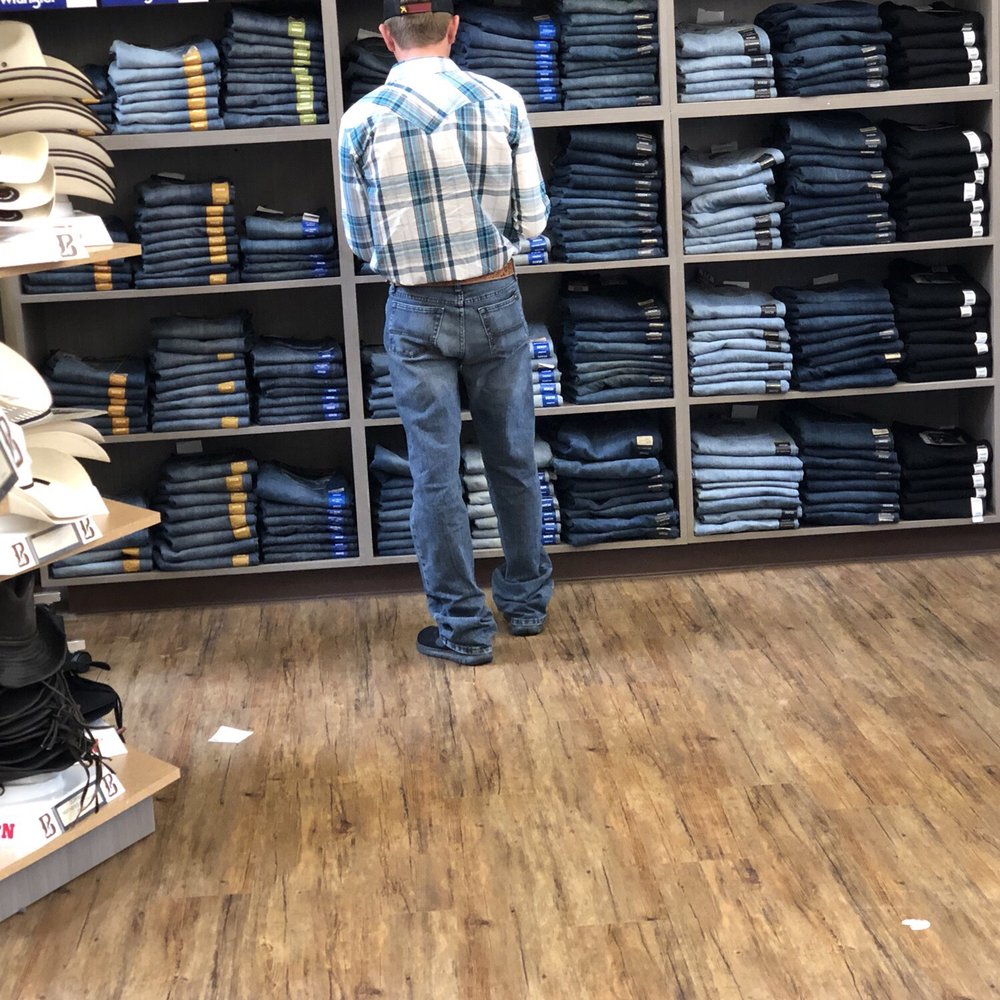 Boot Barn - Choosing a pair of new Wranglers - Shoe Stores Near Me - Greenwood Village, Colorado Boot Barn - Choosing a pair of new Wranglers - Shoe Stores Near Me - Greenwood Village, Colorado