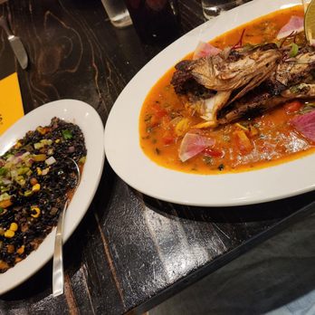 Hugo's Invitados - Branzino and black rice - Seafood Near Me - Irving, Texas Hugo's Invitados - Branzino and black rice - Seafood Near Me - Irving, Texas