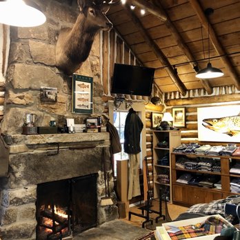 Highland Hiker - Interior - wood fire is burning. - Outdoor Gear Near Me - Highlands, North Carolina Highland Hiker - Interior - wood fire is burning. - Outdoor Gear Near Me - Highlands, North Carolina