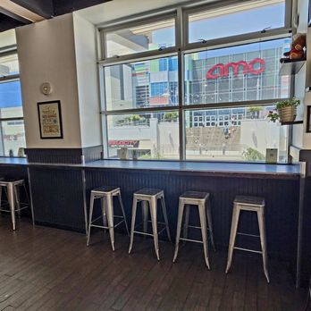 Earthly Plant Based Eatery - Indoor seating with a 2nd floor view. Escalator or stairs nearby, may be other options. - Vegan Near Me - Las Vegas, Nevada