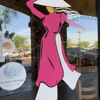 Mekong Supermarket - a woman in a pink dress - International Grocery Near Me - Mesa, Arizona