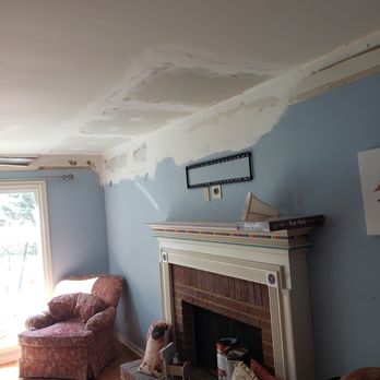 Peach Construction - a fireplace in a living room - General Contractors Near Me - Chula Vista, California