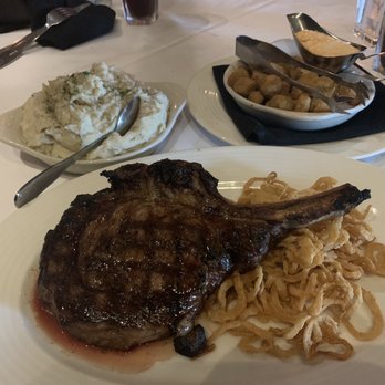 Kirby's Steakhouse - 24 oz Cowboy Cut Ribeye, okra and mashed potatoes - Steakhouses Near Me - Thackerville, Oklahoma