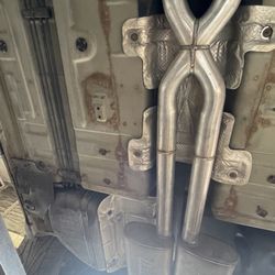 Saldana's ACE Muffler