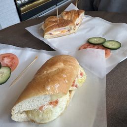 Breakfast sandwich Ham and cheddar and egg Egg and Swiss with tomatoes and onion Breakfast sandwich Ham and cheddar and egg Egg and Swiss with tomatoes and onion