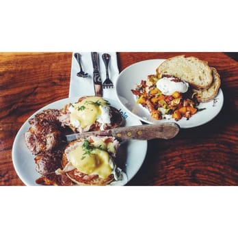 Lola - eggs benedict on the left and toms favorite breakfast on the right! - Greek Near Me - Seattle, Washington