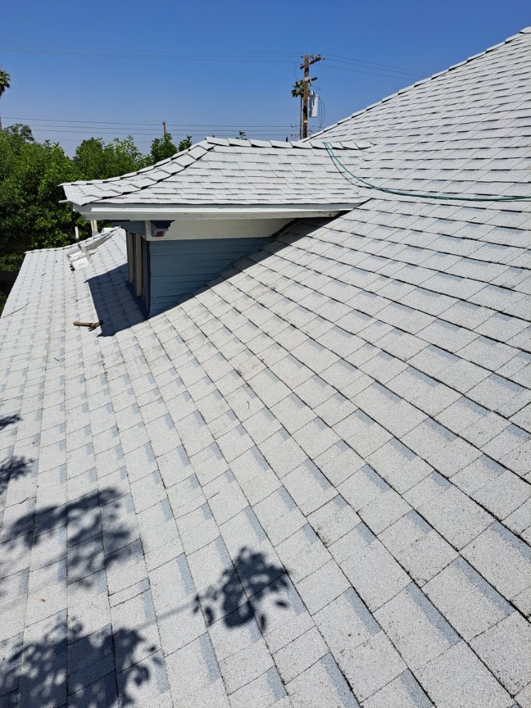 Slide of Eleazars Roofing