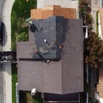 Kayhan's Roofing - Process of removing old shingles - Roofing Near Me