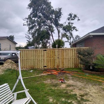 Bay County Property Preservation - a fence being installed - Lawn Services Near Me - Panama City, Florida Bay County Property Preservation - a fence being installed - Lawn Services Near Me - Panama City, Florida