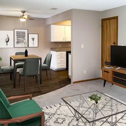 Prairie West Apartments - Apartment dining and living room.  Upgrades unit
