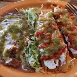 Two tamales (I like sour cream, salsa and hot sauce on them) and beans(normally comes with beans and rice). Two tamales (I like sour cream, salsa and hot sauce on them) and beans(normally comes with beans and rice).