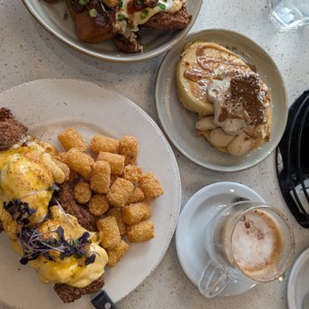 The Twisted Apron - Dirty Bird, Hot honey Benny with tater tots and side of small stack pancakes with biscoff tiramisu topping. - Comfort Food Near Me - Windsor, Ontario