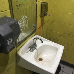 Focus Travel Bus - Nasty. This is how they "care" for their waiting room bathroom.