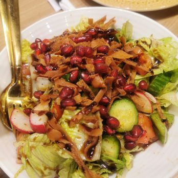 Mosaic Resto Lounge - a plate of salad with a gold spoon - Lounges Near Me - Saint-Laurent, Quebec Mosaic Resto Lounge - a plate of salad with a gold spoon - Lounges Near Me - Saint-Laurent, Quebec