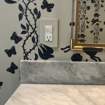 Detail Wallpaper Installation - Detailed work on the outlet - Wallpapering Near Me