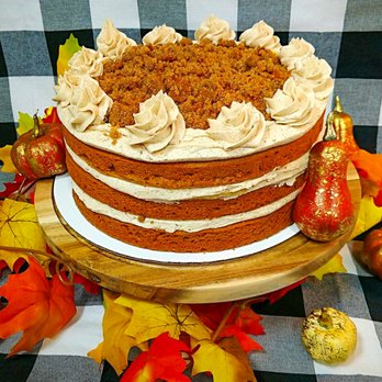 Pammy Cakes - a cake on a platter surrounded by fall leaves - Bakeries Near Me - Norman Park, Georgia